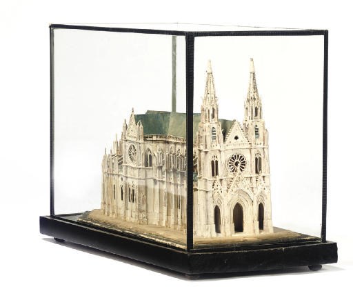 A PAINTED CARD AND PAPER MODEL OF A CATHEDRAL