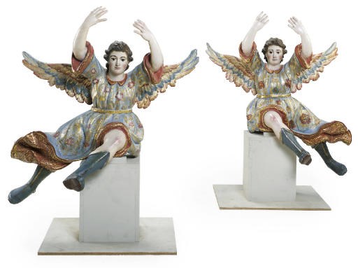 A PAIR OF SPANISH PARCEL-GILT POLYCHROME-DECORATED FIGURES OF ANGELS