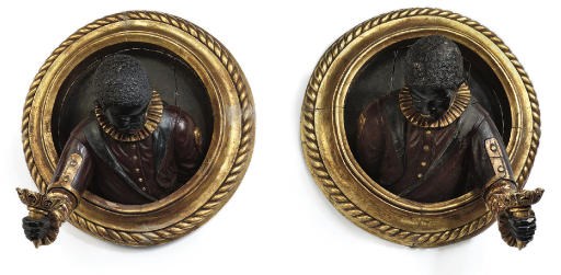 A PAIR OF GILTWOOD AND POLYCHROME BLACKAMOOR WALL APPLIQUES
