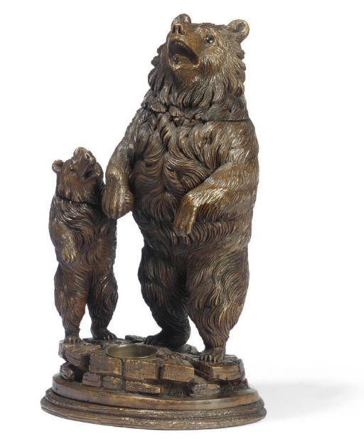 A SWISS 'BLACK FOREST' CARVED WOOD TOBACCO JAR