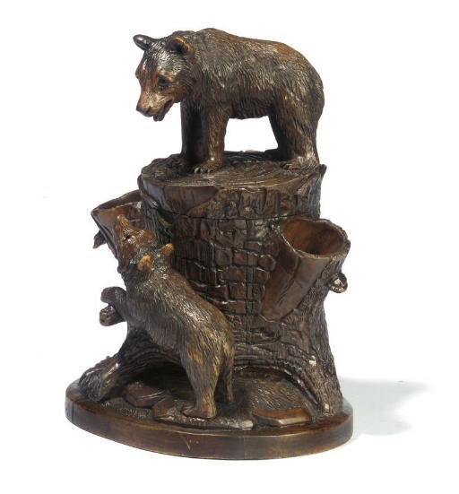 A SWISS 'BLACK FOREST' CARVED WOOD TOBACCO JAR