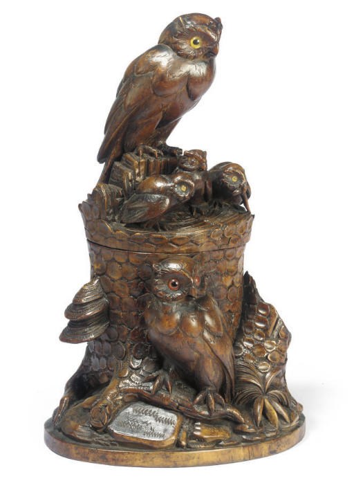 A SWISS 'BLACK FOREST' CARVED WOOD TOBACCO JAR