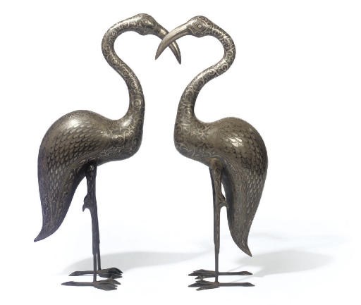 A PAIR OF INDIAN DAMASCENED METAL MODELS OF BIRDS