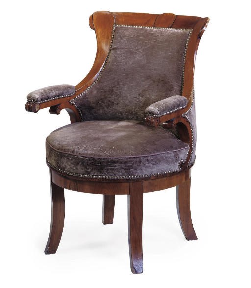 A BIEDERMIER BIRCH AND UPHOLSTERED REVOLVING DESK CHAIR