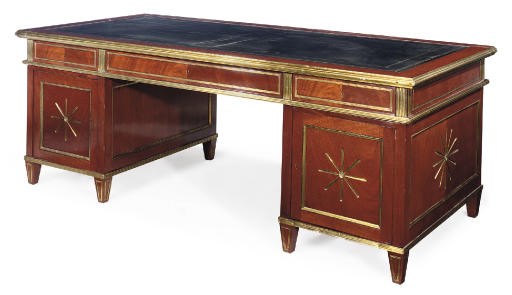 A NORTH EUROPEAN BRASS MOUNTED MAHOGANY PEDESTAL DESK