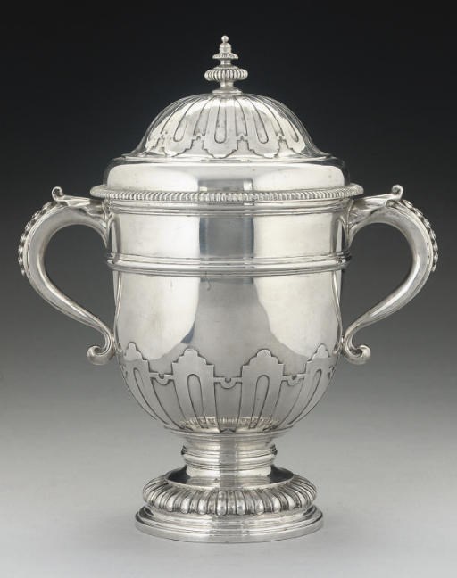 A REPRODUCTION OF A GEORGE I SILVER CUP & COVER,