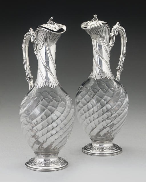 A PAIR OF FRENCH SILVER-MOUNTED GLASS CLARET JUGS,