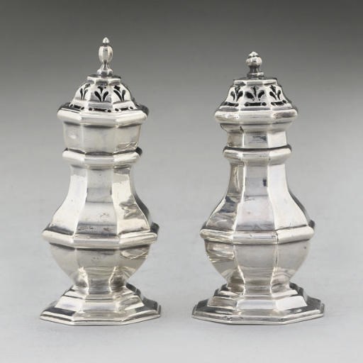 TWO EARLY 18TH CENTURY SILVER OCTAGONAL PEPPERS,