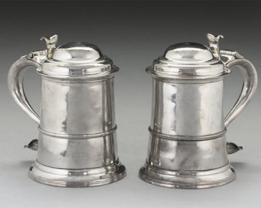 A PAIR OF GEORGE II PROVINCIAL SILVER TANKARDS,