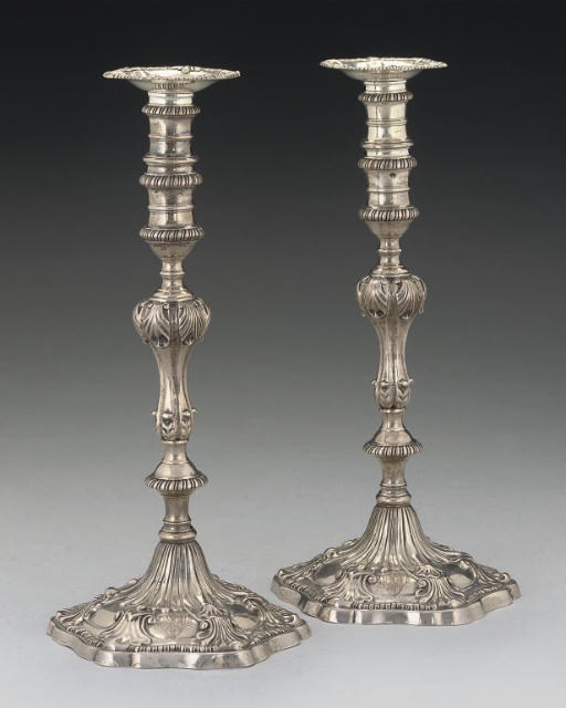 A PAIR OF GEORGE III CAST SILVER CANDLESTICKS,