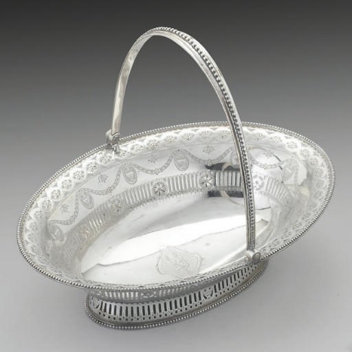 A GEORGE III SILVER SWING-HANDLED OVAL CAKE BASKET,