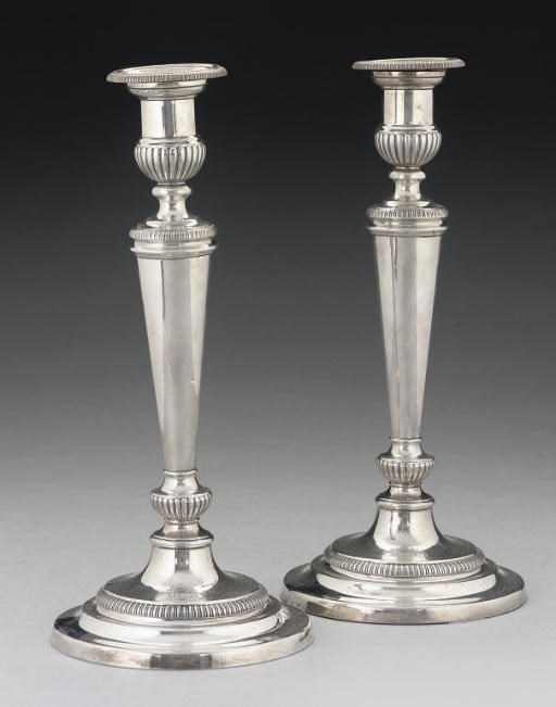 A PAIR OF GEORGE III SILVER CANDLESTICKS,