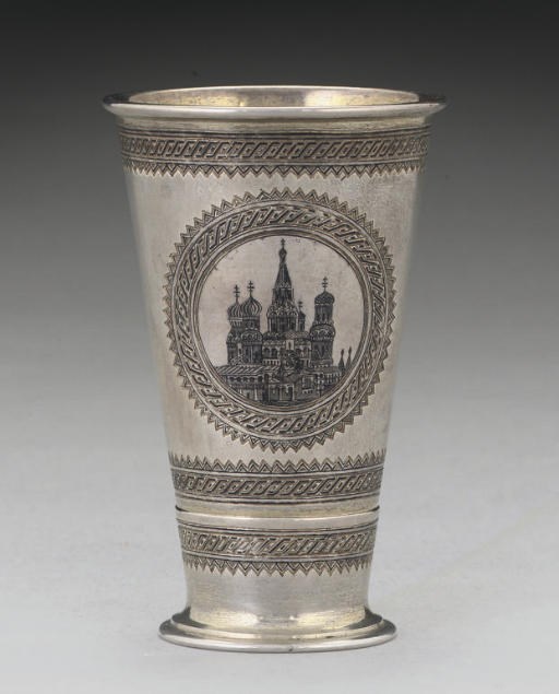 A 19TH CENTURY RUSSIAN PARCEL-GILT SILVER & NIELLO BEAKER,