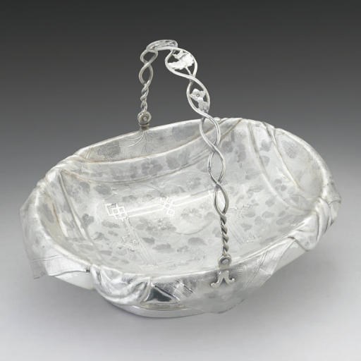 A SMALL 19TH CENTURY RUSSIAN SILVER TROMPE L'OEIL BASKET,