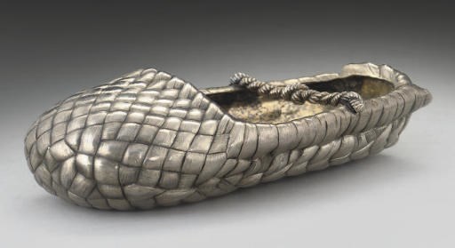 A 19TH CENTURY RUSSIAN SILVER TROMPE L'OEIL ASHTRAY IN THE FORM OF A BAST SHOE,