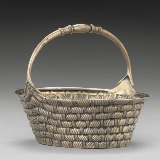 A 19TH CENTURY RUSSIAN SILVER-GILT TROMPE L'OEIL SUGAR BASKET,