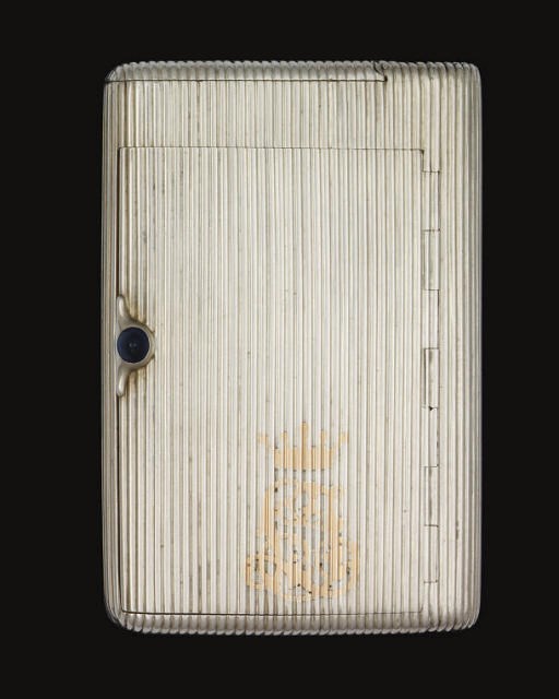 A LATE 19TH CENTURY RUSSIAN SILVER CIGARETTE CASE IN THE MANNER OF FABERGE,