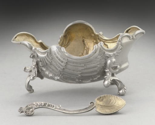 A LATE 19TH CENTURY RUSSIAN SILVER SALT COMPLETE WITH SPOON,