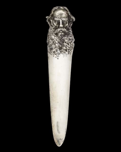 LITERARY INTEREST:- AN UNUSUAL EARLY 20TH CENTURY RUSSIAN SILVER PAPER KNIFE,