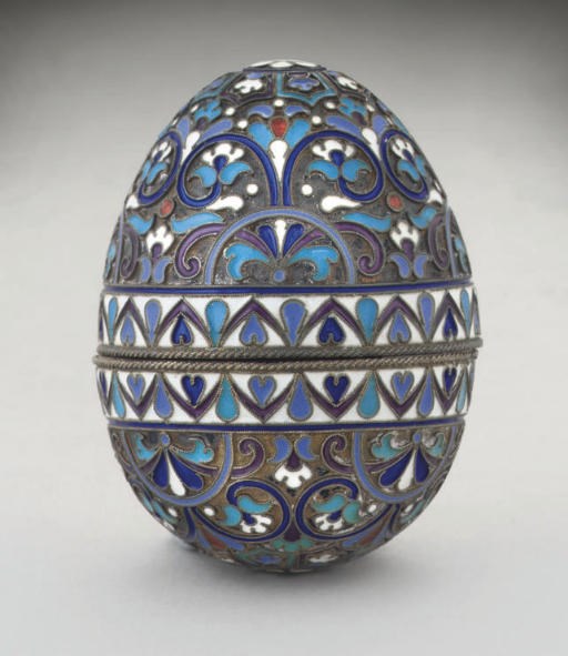 A LATE 19TH CENTURY RUSSIAN SILVER-GILT & CLOISONNE ENAMEL BOX IN FORM OF AN EGG,