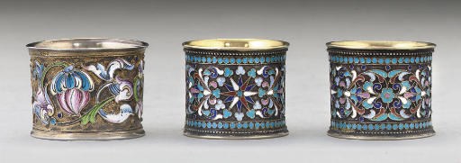 A GROUP OF THREE RUSSIAN SILVER-GILT & CLOISONNE ENAMEL NAPKIN RINGS,