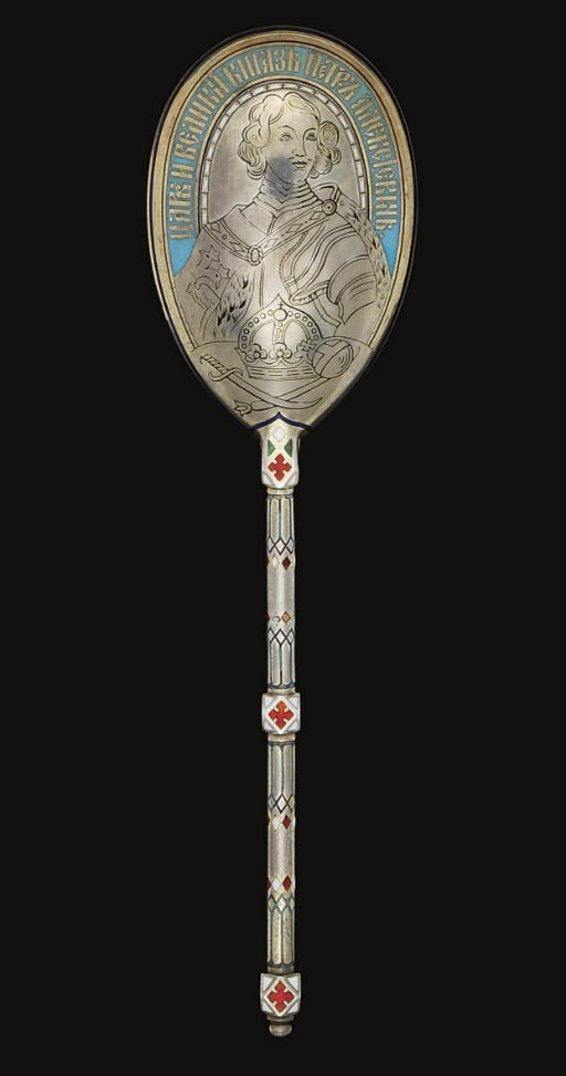 A 19TH CENTURY RUSSIAN PARCEL-GILT SILVER & CHAMPLEVE ENAMEL SPOON,
