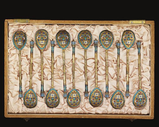 A SET OF TWELVE LATE 19TH CENTURY RUSSIAN SILVER-GILT & CLOISONNE ENAMEL LEMON-TEA SPOONS,