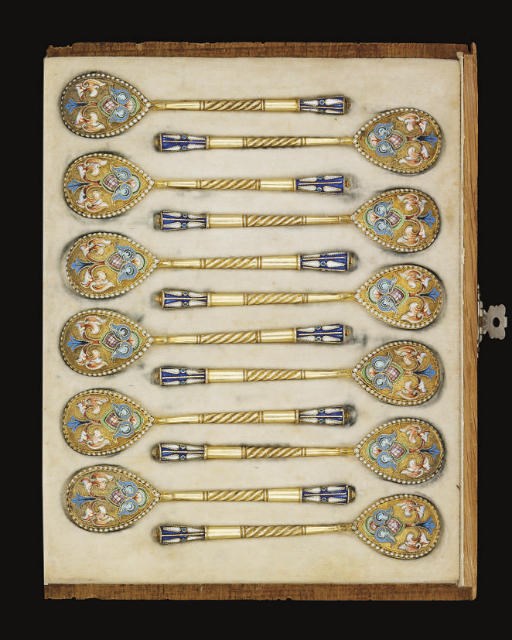 A SET OF TWELVE EARLY 20TH CENTURY SILVER-GILT & CLOISONNE ENAMEL DEMI-TASSE SPOONS,