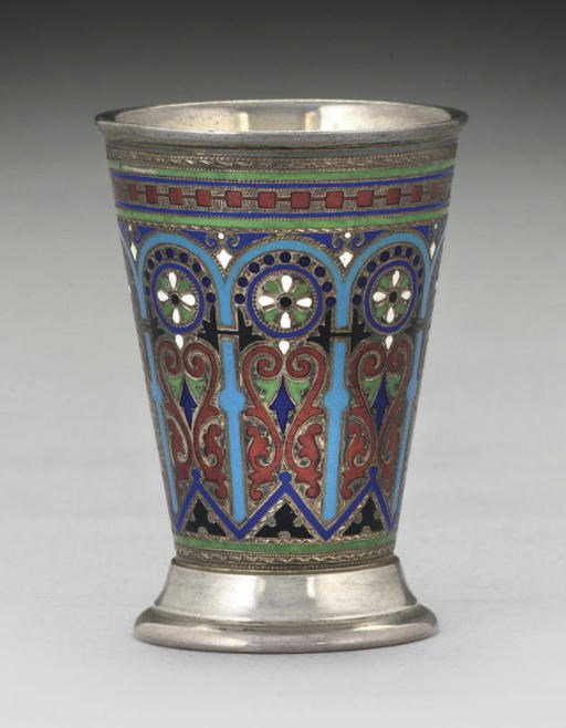 A SMALL LATE 19TH CENTURY RUSSIAN PARCEL-GILT SILVER & CHAMPLEVE ENAMEL BEAKER,