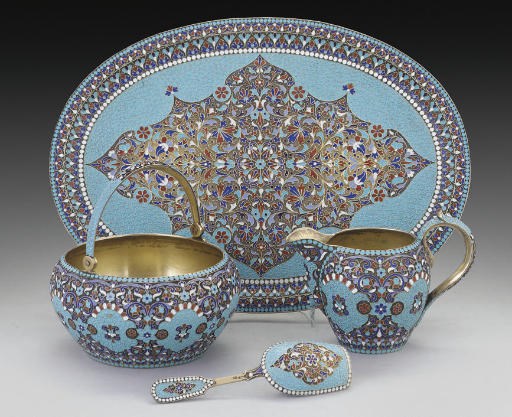 A LATE 19TH/EARLY 20TH CENTURY RUSSIAN SILVER-GILT & CLOISONNE ENAMEL SUGAR BOWL, CREAM JUG, CADDY SPOON & OVAL TRAY EN SUITE,