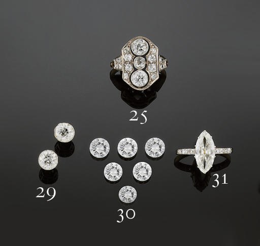 A pair of diamond single stone earstuds