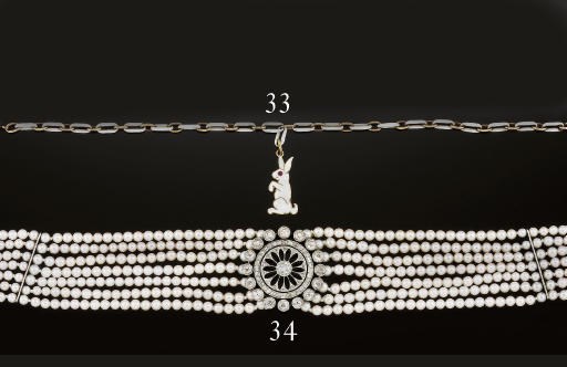 A cultured pearl choker necklace with Edwardian diamond centre