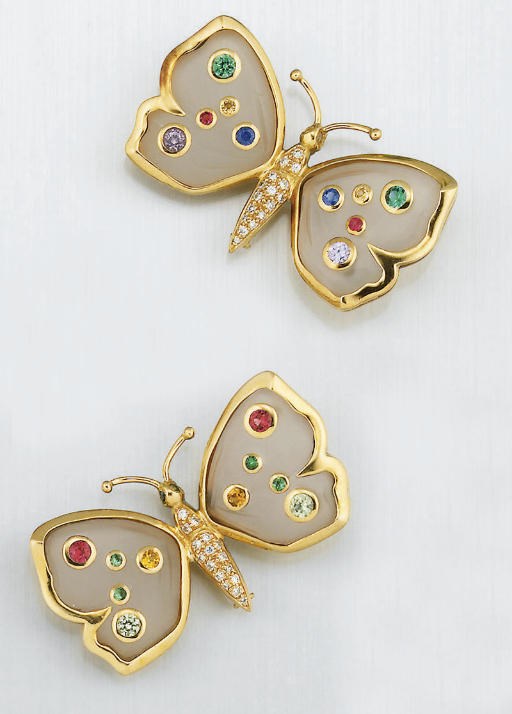 A pair of diamond and gem butterfly brooches