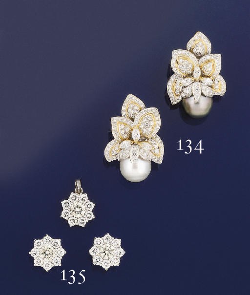 A pair of diamond cluster earstuds and a pendant