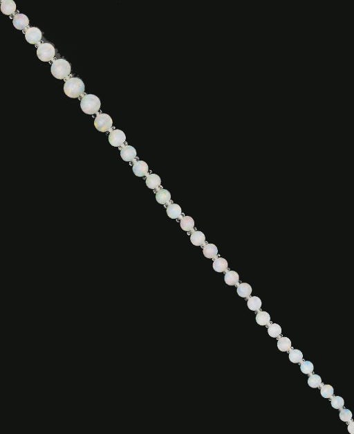 An opal bead and rock crystal necklace
