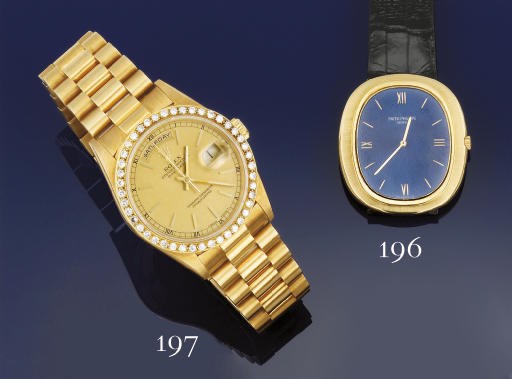 AN 18CT. GOLD AUTOMATIC CALENDER WRISTWATCH, BY ROLEX