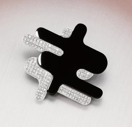 A DIAMOND AND ONYX BROOCH, BY YUJI TAKAHASHI