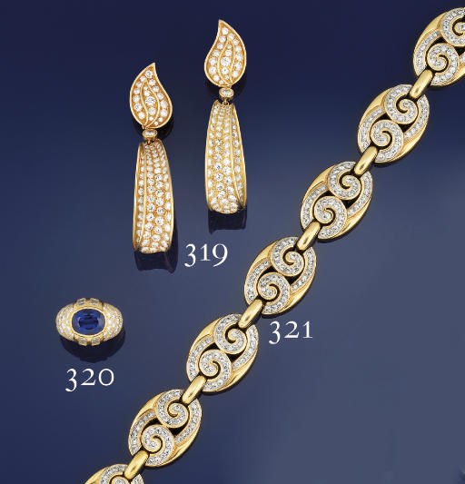 A pair of diamond earpendants, by Fred