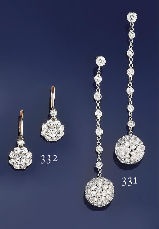 A pair of diamond cluster earpendants