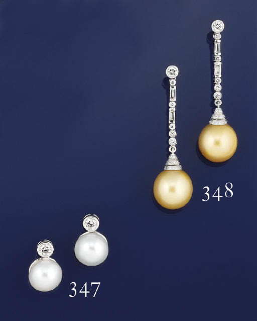 A PAIR OF CULTURED PEARL AND DIAMOND EARPENDANTS