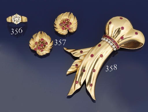 A pair of ruby earclips, by Van Cleef & Arpels