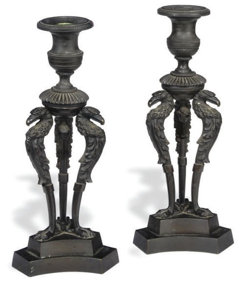 A PAIR OF REGENCY BRONZE CANDLESTICKS