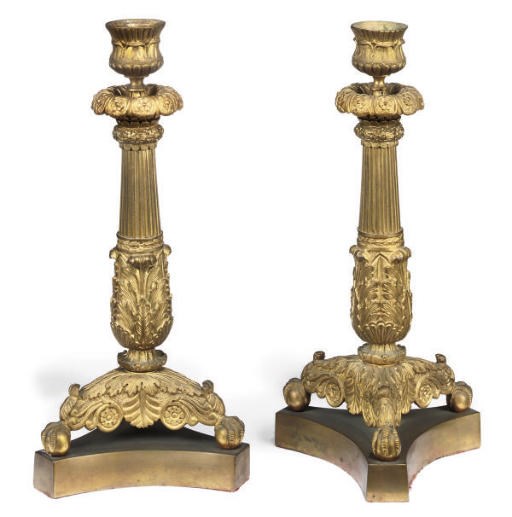 A PAIR OF REGENCY GILT-BRONZE CANDLESTICKS