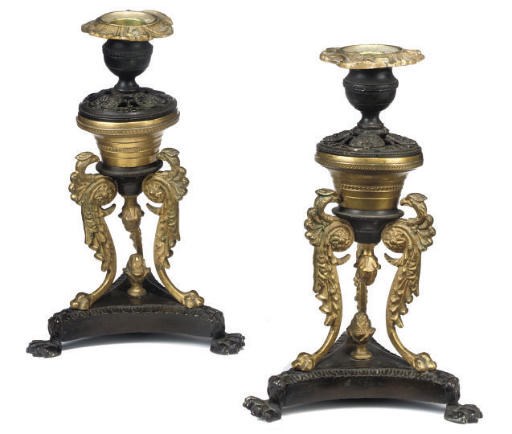 A PAIR OF WILLIAM IV BRONZE AND GILT-BRONZE CANDLESTICKS