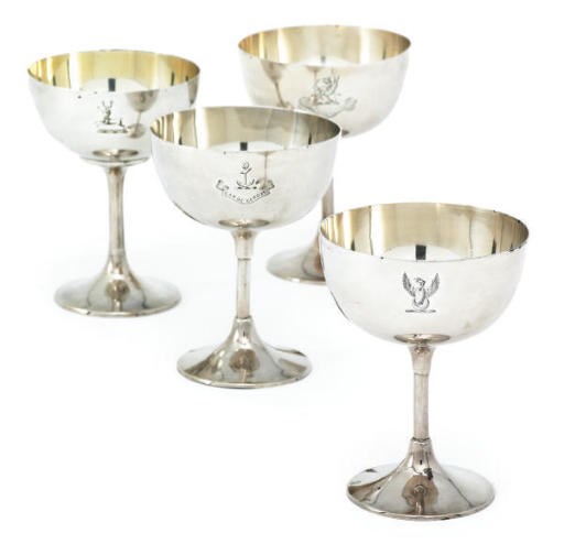FOUR LATE VICTORIAN SILVER CHAMPAGNE CUPS