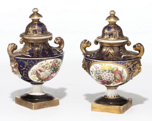 A PAIR OF ENGLISH PORCELAIN BLUE-GROUND URN-SHAPED VASES AND DOMED COVERS