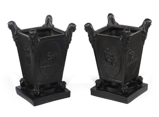 A PAIR OF TURNER BLACK BASALT FLOWER POTS