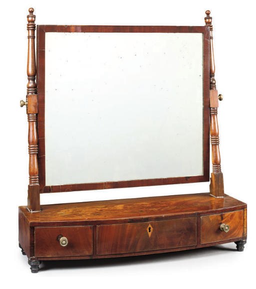 A REGENCY MAHOGANY BOW FRONT DRESSING MIRROR