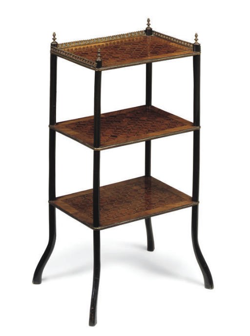 A NAPOLEON III GILT-METAL MOUNTED KINGWOOD AMBOYNA AND EBONISED THREE TIER ETÈRE