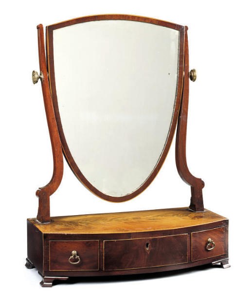 A GEORGE III MAHOGANY AND CROSSBANDED BOWFRONT DRESSING MIRROR